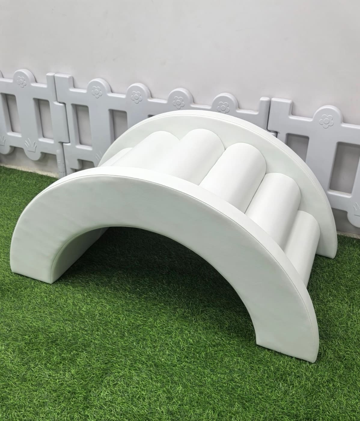 White soft-play arch climber with rolled steps